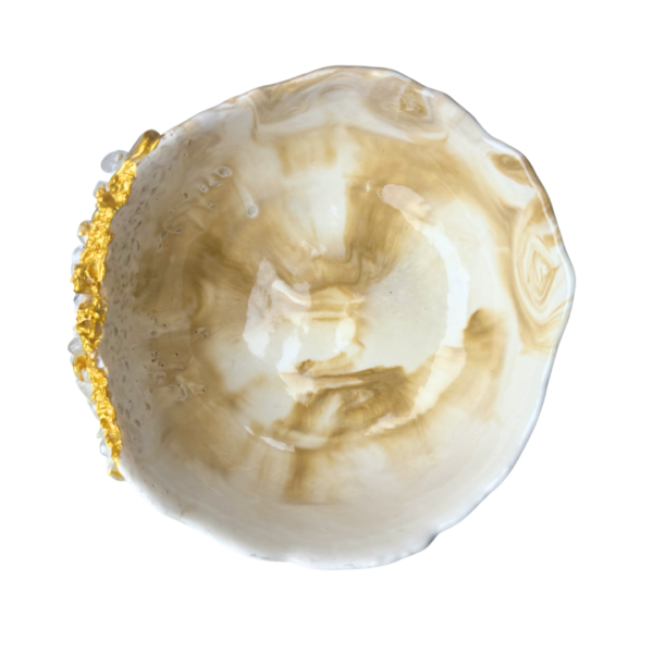 Top view of a handcrafted Jesmonite bowl with a marbled gold design, golden Kintsugi detailing, and clear quartz accents, perfect for home decor in Dubai, UAE