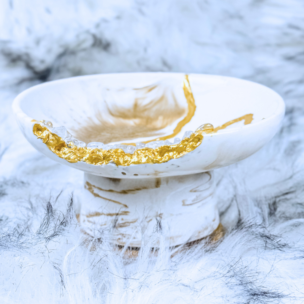 Luminous Alchemy Pedestal Bowl with golden marbled design, Kintsugi-inspired details, and clear quartz accents, handcrafted in Dubai, UAE